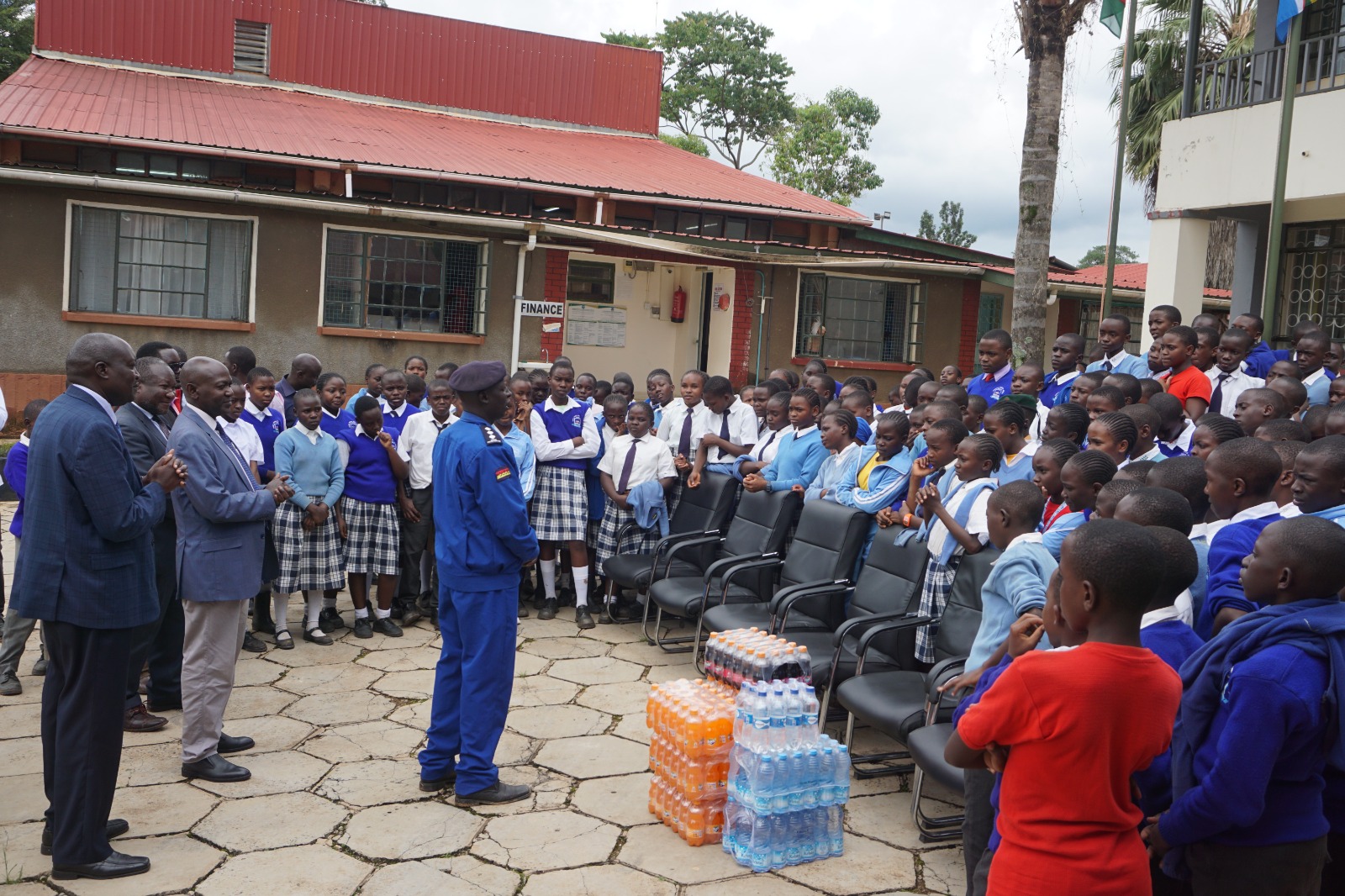 Cheptulu OCS addressing students befote the planting of trees