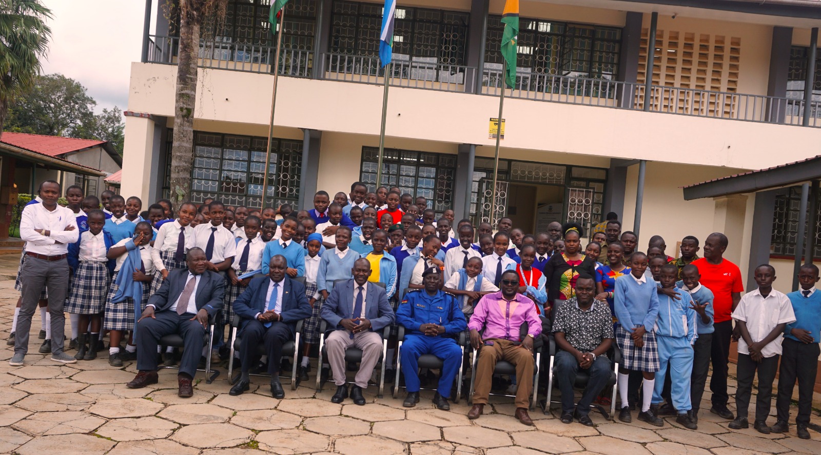 Photo session of the students OCS and KAFUs top management after planting trees